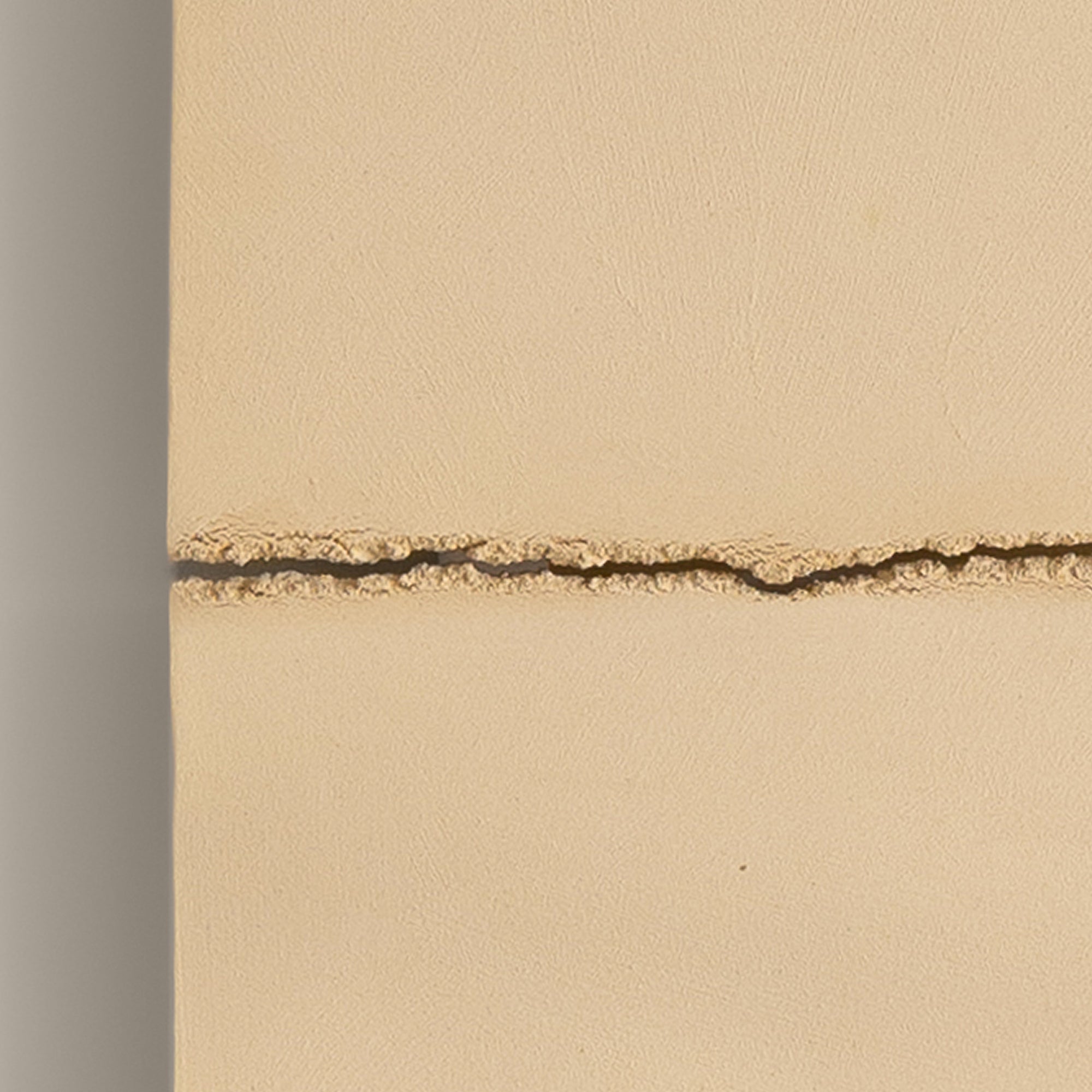 Writings 002 by Studio JOA — close-up of the horizontal seam in Butter Yellow stoneware, showing the hand-brushed surface texture