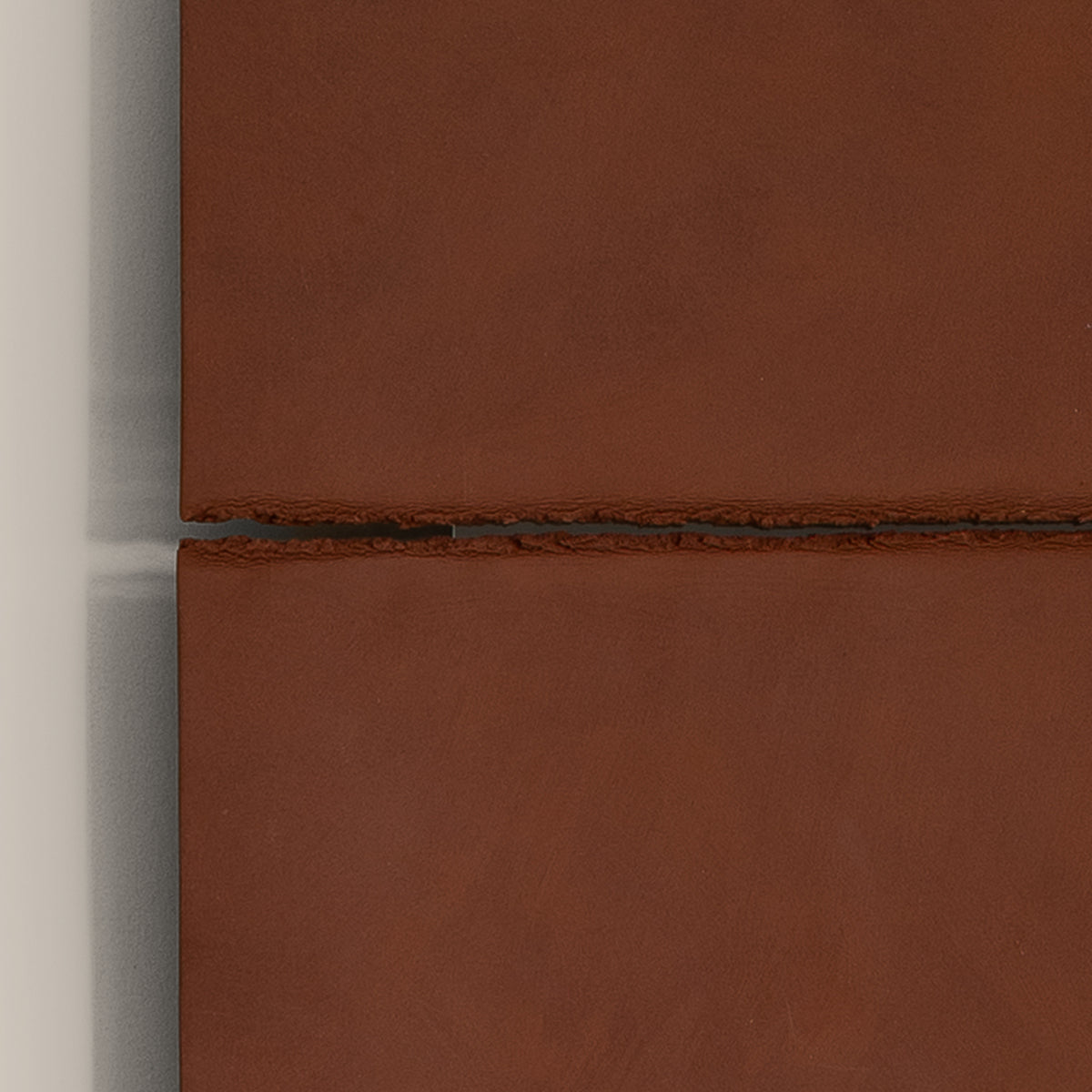Writings 002 by Studio JOA — close-up of the horizontal seam in Stone Red stoneware, showing the hand-brushed surface texture