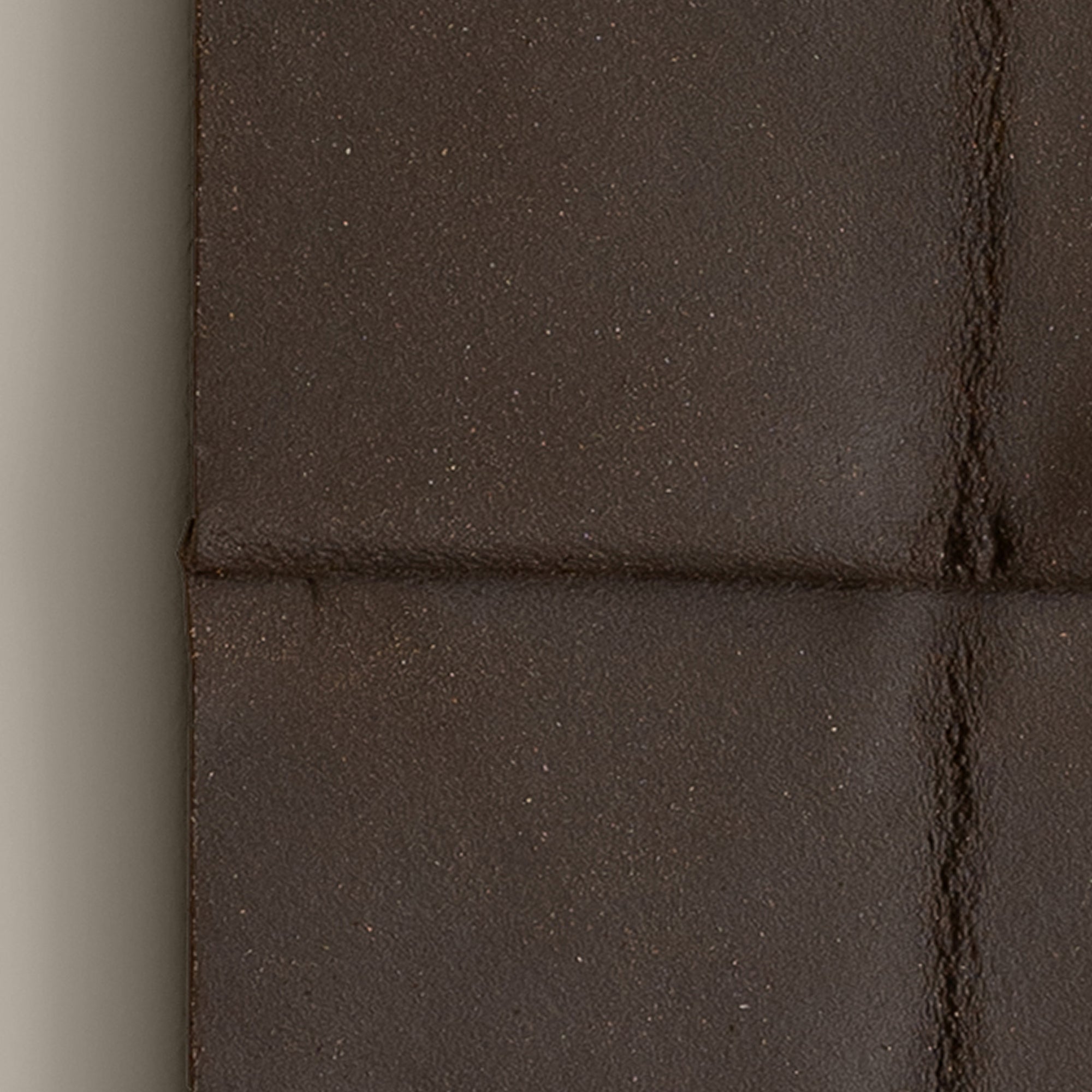 Writings 004 by Studio JOA — close-up of the cross-shaped seam in Dark Brown stoneware, showing the hand-brushed surface texture