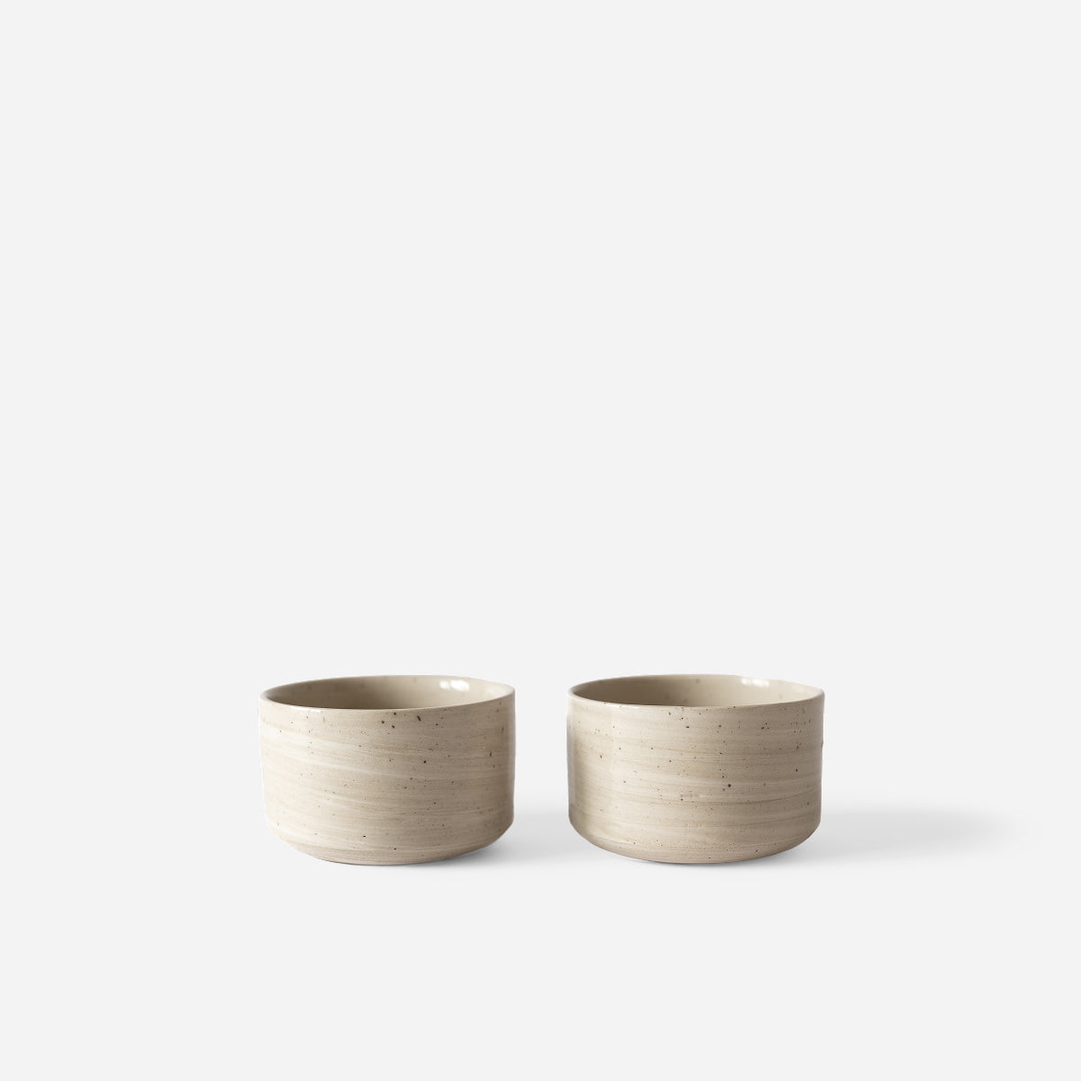 Set of two light marbled cups