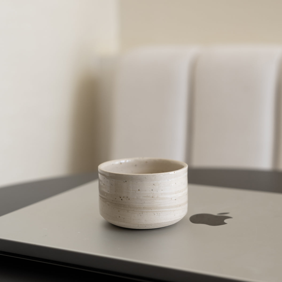 Set of two light marbled cups